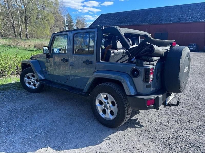 Grå Begagnad 2015 Jeep Wrangler Unlimited SUV | 295 000 kr (Bra pris) - Bild 1/4