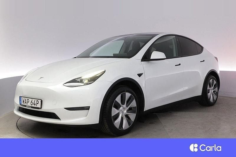 Vit Begagnad 2023 Tesla Model Y Long Range AWD SUV | 394 900 kr - Bild 1/4