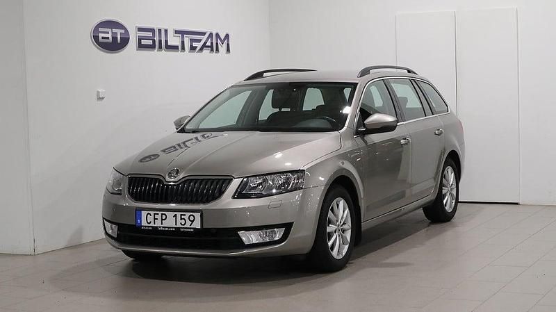 Ljusbrun Begagnad 2014 Skoda Octavia Ambition Kombi | 149 900 kr (Dyr) - Bild 1/4