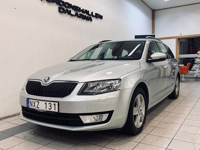 Silver Begagnad 2013 Skoda Octavia Ambition Kombi | 79 900 kr (Marknadspris) - Bild 1/4