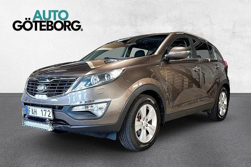 Ljusbrun (brun metallic) Begagnad 2013 Kia Sportage EX SUV | 84 900 kr (Bra pris) - Bild 1/4
