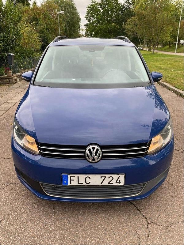 Blå Begagnad 2011 VW Touran Minibuss | 60 000 kr (Bra pris) - Bild 1/4
