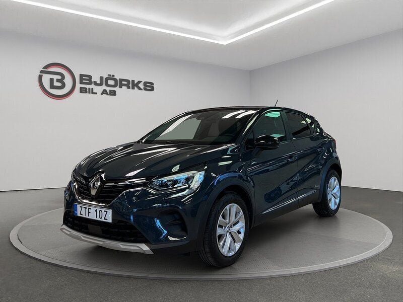 Blå Begagnad 2021 Renault Captur Zen SUV | 194 500 kr (Marknadspris) - Bild 1/4