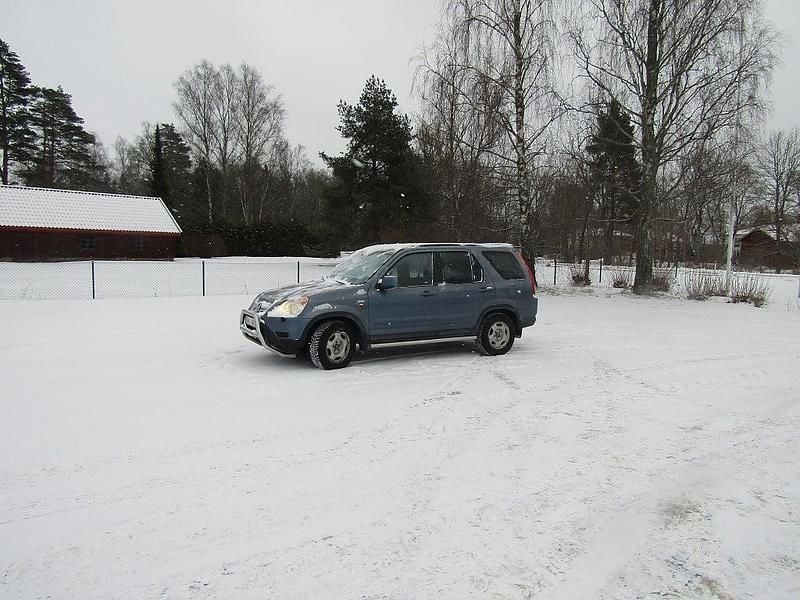 Blå metallic Begagnad 2002 Honda CR-V SUV | 49 000 kr (Marknadspris) - Bild 1/4
