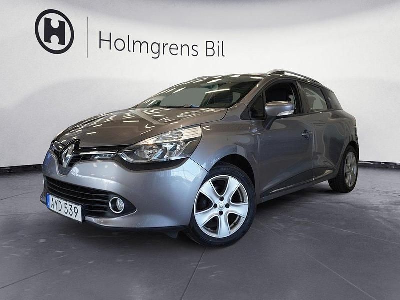Grå Begagnad 2016 Renault Clio GrandTour Dynamique Kombi | 64 900 kr (Marknadspris) - Bild 1/4