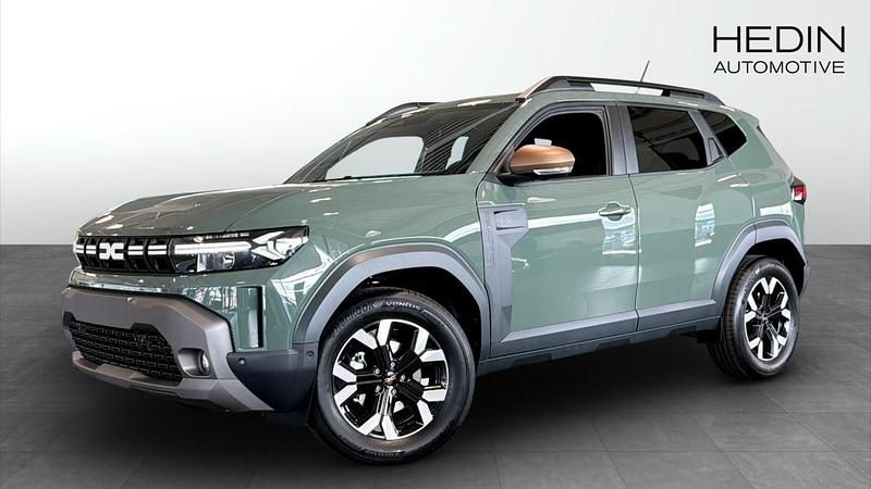 Grå (green) Ny 2025 Dacia Duster Extreme SUV | 345 700 kr (Marknadspris) - Bild 1/4