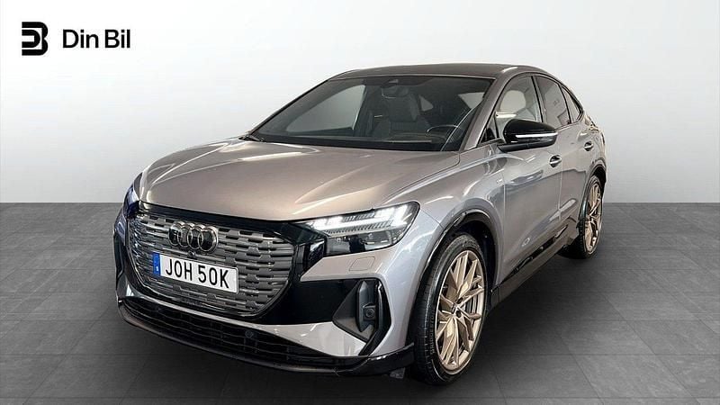 Grå Begagnad 2022 Audi Q4 Sportback e-tron S-Line SUV | 429 900 kr (Bra pris) - Bild 1/4