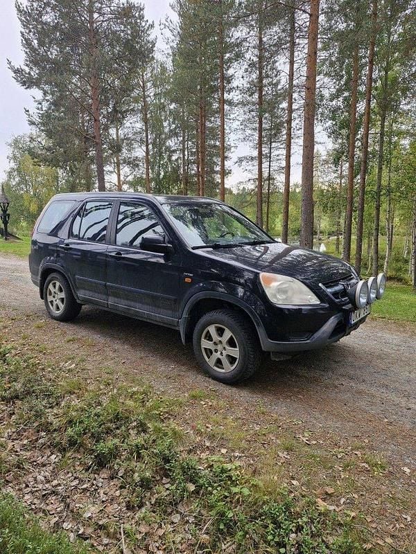 Svart Begagnad 2003 Honda CR-V SUV | 34 000 kr (Lite dyr) - Bild 1/4