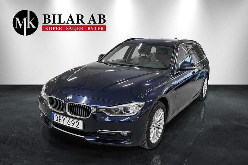 Blå Begagnad 2014 BMW 320 Kombi | 164 900 kr (Marknadspris) - Bild 1/4