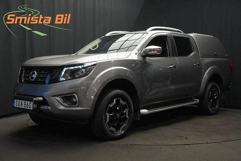 Grå Begagnad 2021 Nissan Navara Tekna Pickup | 348 900 kr (Marknadspris) - Bild 1/3