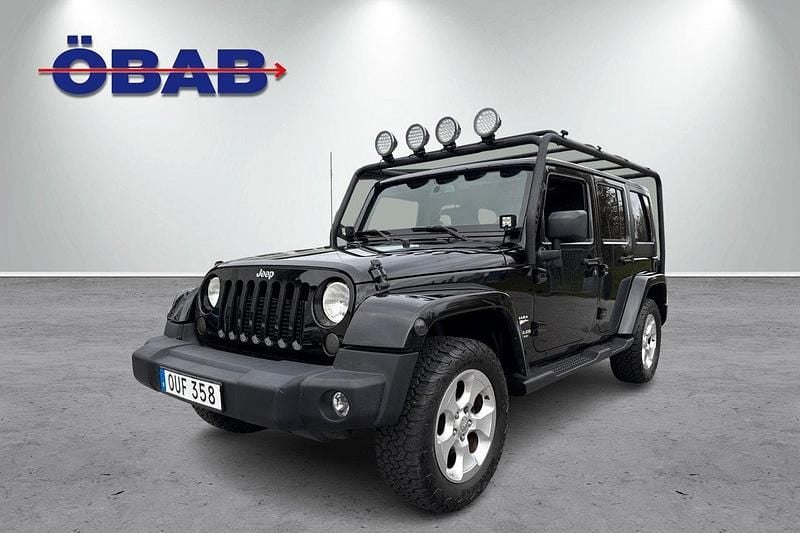 Svart Begagnad 2015 Jeep Wrangler Unlimited Sahara SUV | 338 000 kr (Dyr) - Bild 1/4