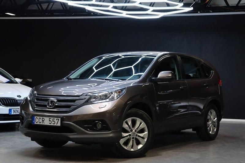 Grå Begagnad 2013 Honda CR-V SUV | 149 900 kr (Marknadspris) - Bild 1/4