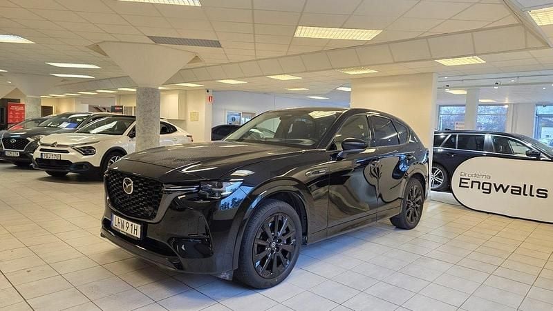 Svart Begagnad 2023 Mazda CX-60 Homura-Line SUV | 324 900 kr (Marknadspris) - Bild 1/4