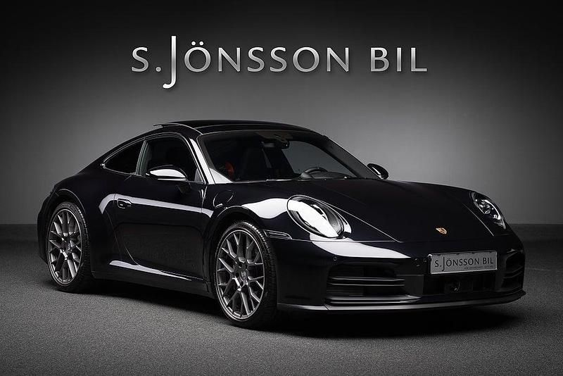 Svart Begagnad 2024 Porsche 911 Carrera Sportkupé | 1 495 000 kr (Superpris) - Bild 1/4