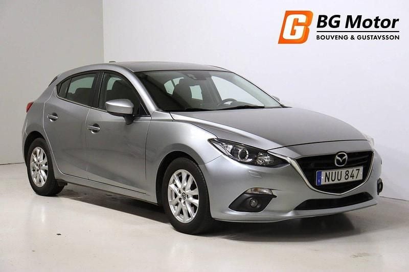 Grå Begagnad 2015 Mazda 3 Inclusive Halvkombi | 119 900 kr (Marknadspris) - Bild 1/3
