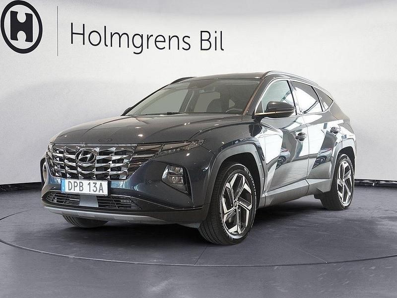 Blå (dark teal metallic) Begagnad 2022 Hyundai Tucson Advanced SUV | 389 800 kr (Dyr) - Bild 1/4