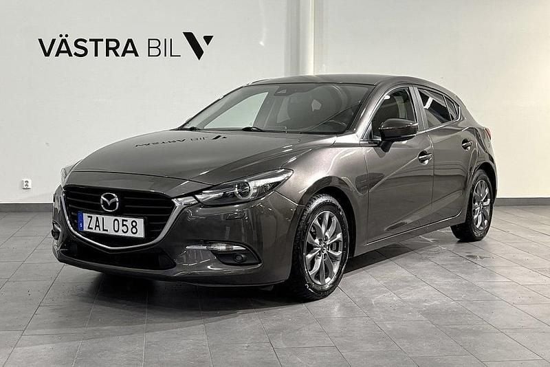 Brun Begagnad 2017 Mazda 3 Vision Halvkombi | 149 900 kr (Marknadspris) - Bild 1/4