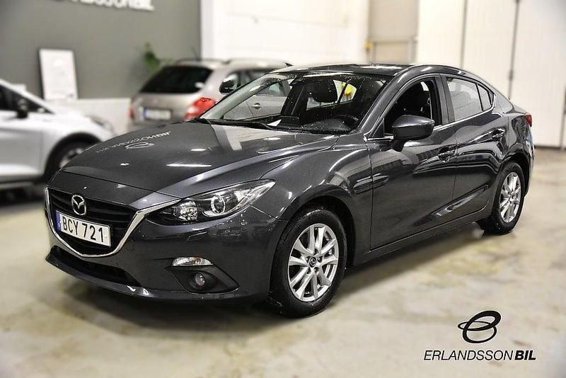 Grå Begagnad 2014 Mazda 3 Sedan | 144 900 kr (Marknadspris) - Bild 1/4