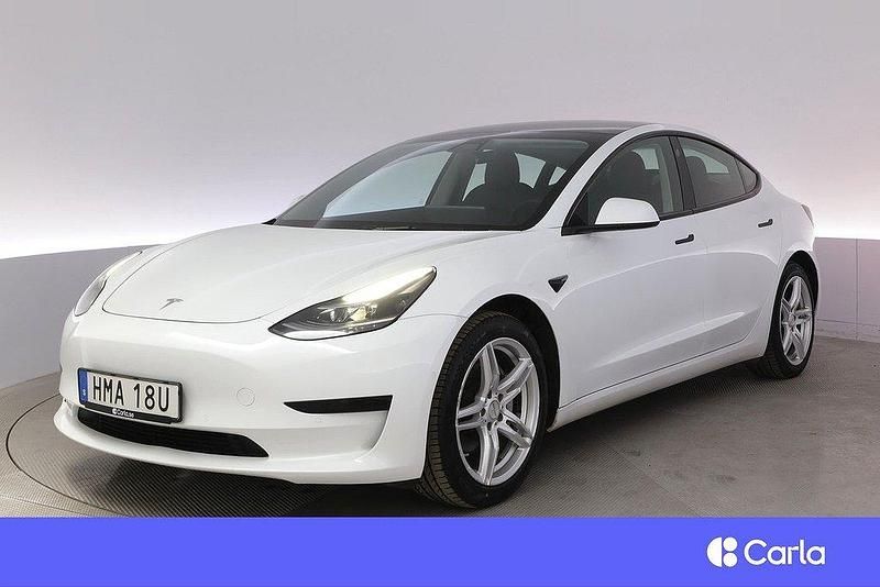 Vit Begagnad 2021 Tesla Model 3 Standard Range Plus Sedan | 259 900 kr (Marknadspris) - Bild 1/4