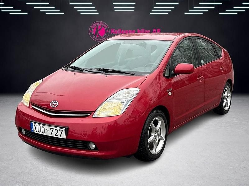 Mörkröd Begagnad 2006 Toyota Prius Halvkombi | 84 900 kr (Lite dyr) - Bild 1/4