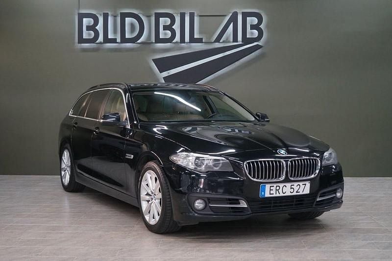 Svart Begagnad 2015 BMW 520 Kombi | 109 900 kr (Marknadspris) - Bild 1/4