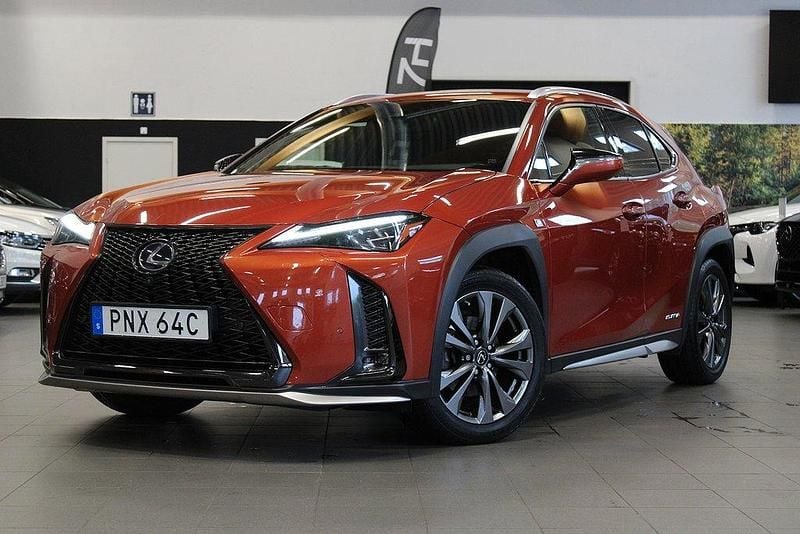 Orange Begagnad 2019 Lexus UX 250h E-FOUR SUV | 249 900 kr (Lite dyr) - Bild 1/4