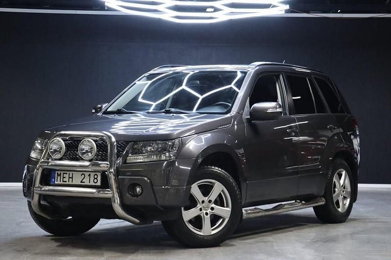 Grå Begagnad 2012 Suzuki Grand Vitara SUV | 119 900 kr - Bild 1/4