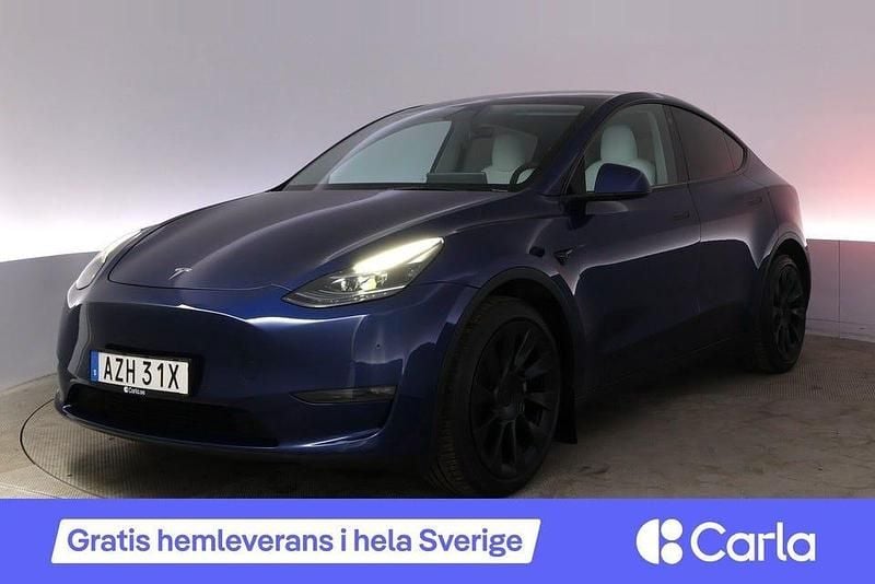 Blå Begagnad 2021 Tesla Model Y Long Range AWD SUV | 343 990 kr (Marknadspris) - Bild 1/4