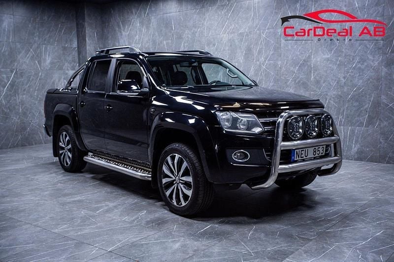 Svart Begagnad 2013 VW Amarok Highline Pickup | 139 800 kr (Marknadspris) - Bild 1/4