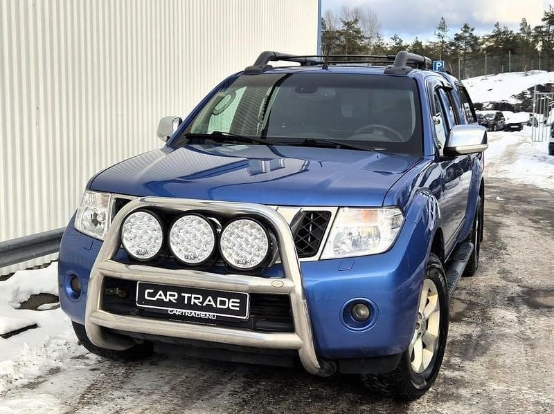 Blå Begagnad 2012 Nissan Navara Pickup | 89 900 kr (Marknadspris) - Bild 1/4