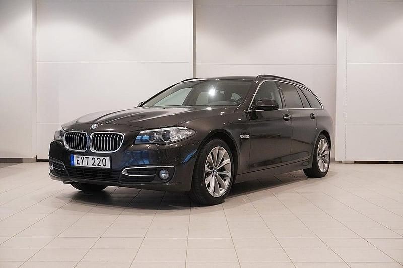 Brun Begagnad 2015 BMW 520 Luxury Line Kombi | 164 800 kr (Marknadspris) - Bild 1/4