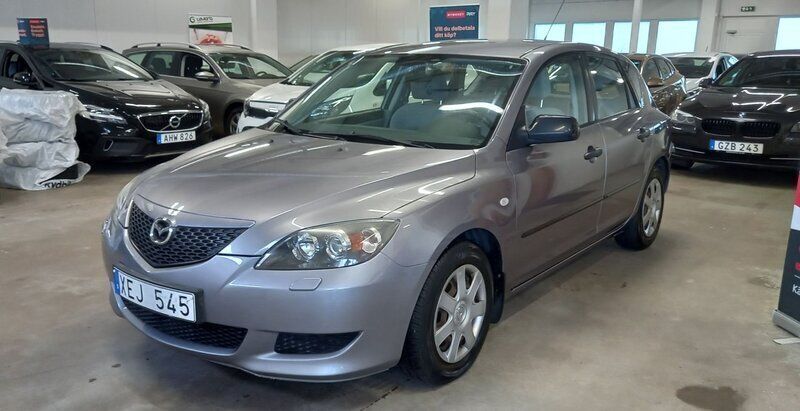 Grå Begagnad 2006 Mazda 3 Inclusive Halvkombi | 37 000 kr (Marknadspris) - Bild 1/4