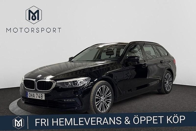 Svart metallic Begagnad 2020 BMW 520 Sport Line Kombi | 299 900 kr (Bra pris) - Bild 1/3