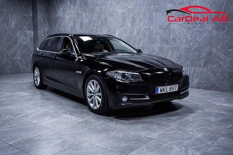 Svart Begagnad 2017 BMW 520 Kombi | 129 800 kr (Marknadspris) - Bild 1/4
