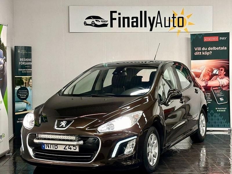 Brun Begagnad 2012 Peugeot 308 Halvkombi | 53 900 kr (Marknadspris) - Bild 1/4