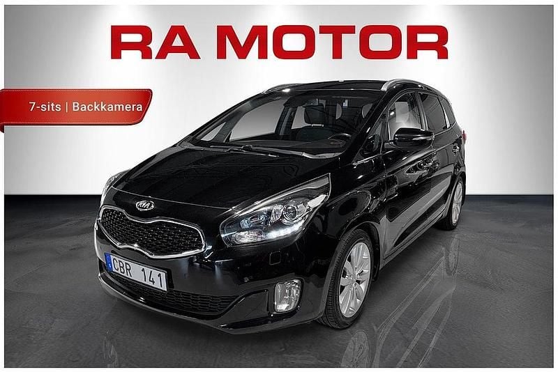 Svart Begagnad 2013 Kia Carens Advance Minibuss | 129 900 kr (Marknadspris) - Bild 1/4