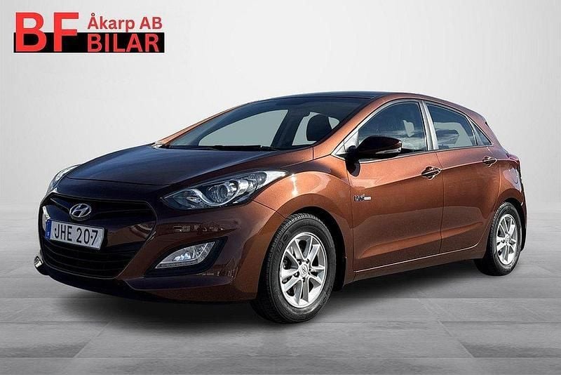 Brun Begagnad 2014 Hyundai i30 Halvkombi | 79 500 kr (Marknadspris) - Bild 1/4