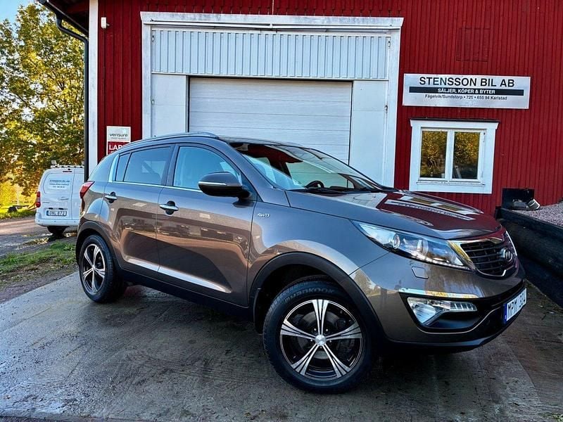 Ljusbrun Begagnad 2010 Kia Sportage Comfort SUV | 89 500 kr (Marknadspris) - Bild 1/4