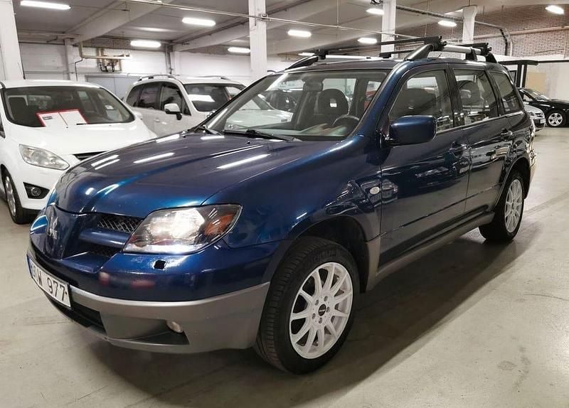 Mörkblå Begagnad 2003 Mitsubishi Outlander SUV | 24 900 kr (Marknadspris) - Bild 1/4