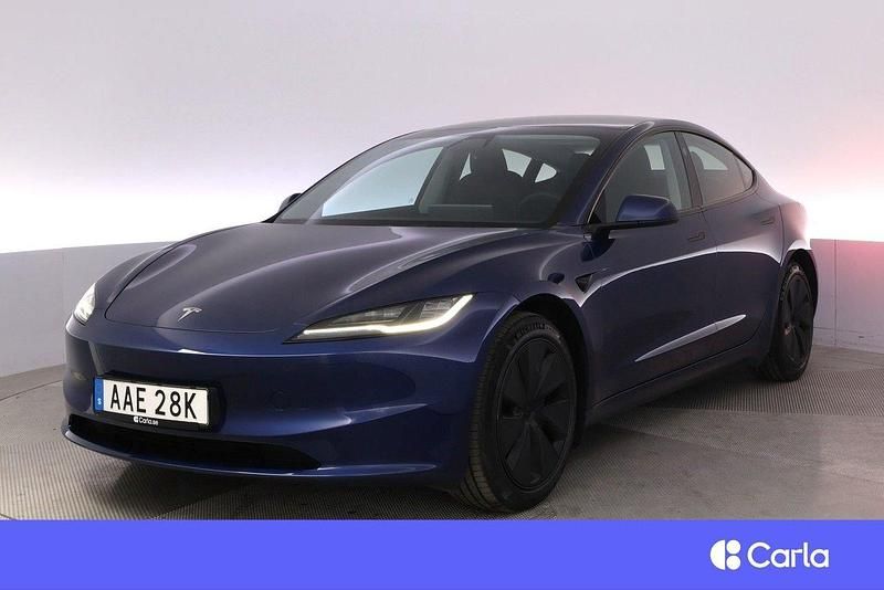 Blå Begagnad 2024 Tesla Model 3 Long Range AWD Sedan | 498 900 kr - Bild 1/4