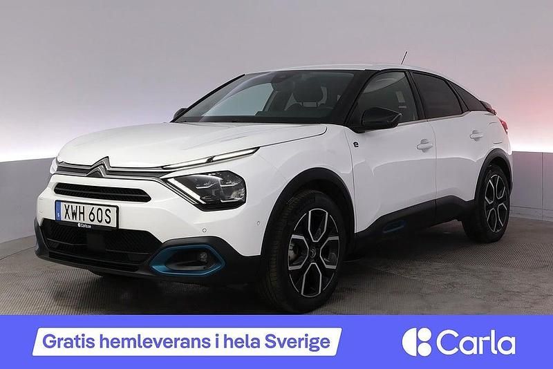 Vit Begagnad 2021 Citroën e-C4 Shine Halvkombi | 185 990 kr (Marknadspris) - Bild 1/4