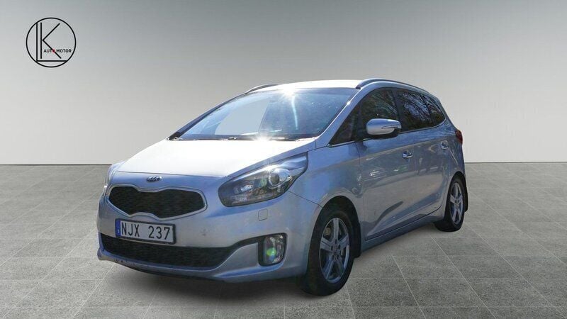 Grå Begagnad 2013 Kia Carens Minibuss | 59 900 kr (Marknadspris) - Bild 1/4