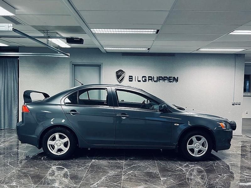 Begagnad Mitsubishi Lancer Inform 143 HK (105 kW) 2008 Grå Sedan