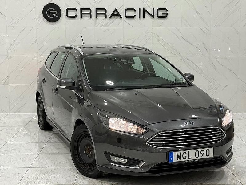Grå Begagnad 2015 Ford Focus Titanium Kombi | 69 900 kr (Bra pris) - Bild 1/4
