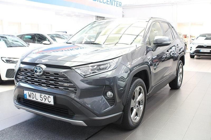 Mörkgrå Begagnad 2021 Toyota RAV4 Hybrid Executive SUV | 349 900 kr (Bra pris) - Bild 1/4
