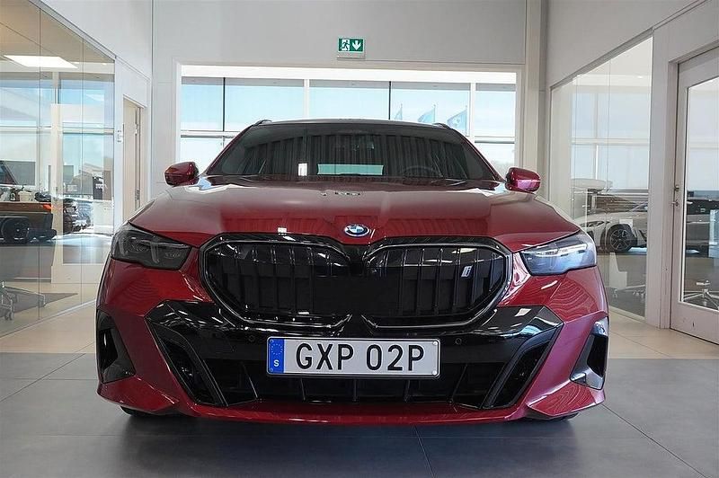 Begagnad BMW i5 M Sport 442 kW (601 HK) 2024 Röd/orange Sedan