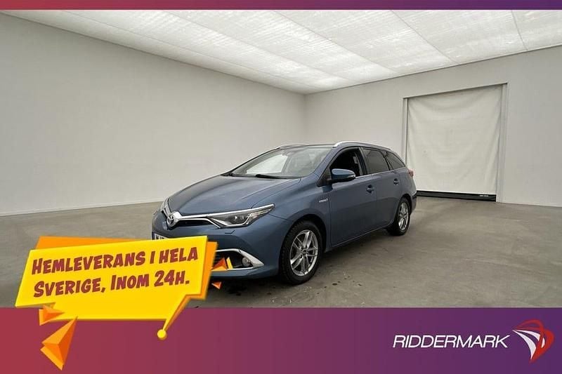 Blå Begagnad 2016 Toyota Auris Hybrid Executive Kombi | 174 800 kr (Marknadspris) - Bild 1/3