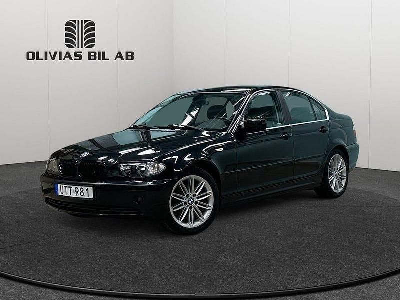 Svart Begagnad 2004 BMW 320 Sedan | 44 400 kr (Marknadspris) - Bild 1/4