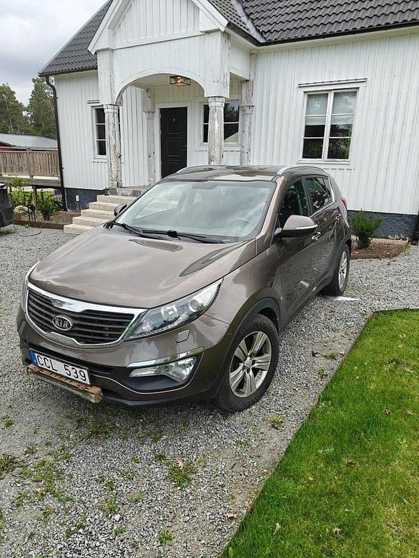 Brun Begagnad 2012 Kia Sportage SUV | 55 000 kr (Bra pris) - Bild 1/4