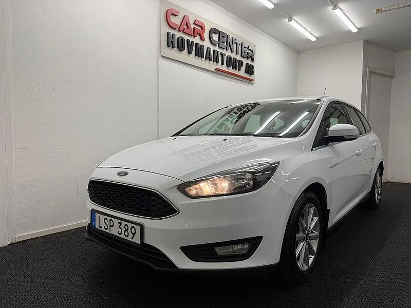 Vit Begagnad 2014 Ford Focus Titanium Kombi | 59 900 kr (Marknadspris) - Bild 1/4